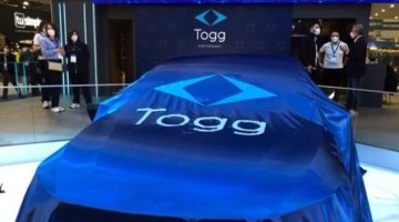TOGG, ABD'de sergilendi! İşte sedan modelinden ilk görüntüler